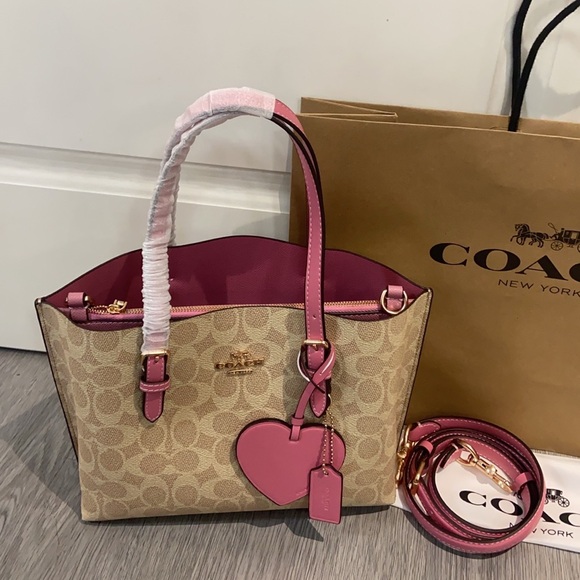 Coach Handbags - 💗💗Coach Pink Signature Canvas Crossbody Tote